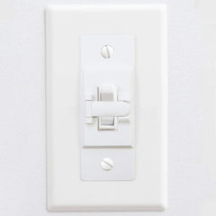 2FY2SW guard installation on a standard wall switch plate