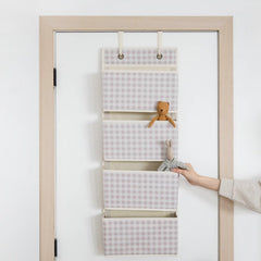3 Sprouts nursery decor in gingham beige adding stylish storage.
