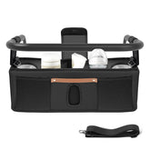 3 BUZZLETT parent console organizer attached to stroller handle with easy access to snacks.