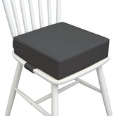 AAAini toddler booster seat in rock grey PU fabric offers comfy meal-time support.