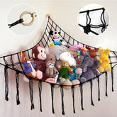 ABBY BABY large stuffed animal hammock corner showing ample toy storage in a cozy playroom.