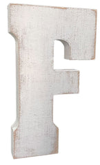 ABELLOTS distressed white wash letter F shown in nursery decor for warm learning space.