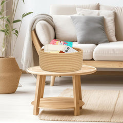 ABenkle nursery side-table basket keeps essentials within easy reach.