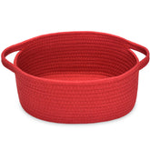 ABenkle small basket with handles in a rope weave for nursery organization.