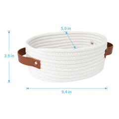 ABenkle small woven basket with handles for easy bedside organization.