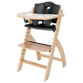 Abiie Beyond Junior high chair with tray and adjustable height for growing kids.