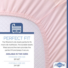 Close-up of Abstract pink sheet knit highlights soft jersey texture.