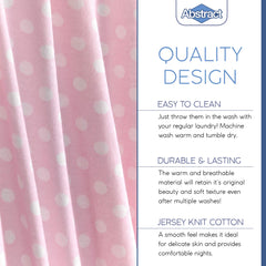 Abstract fitted sheets are machine washable for easy nursery care.