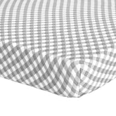 Abstract Mini Crib Sheets in checkered gray offer soft comfort and a snug fit for crib mattresses.