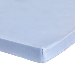 Abstract mini crib sheets solid blue closeup showcases soft jersey cotton for gentle sleep.