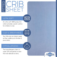 Abstract pack n play sheets snug fit demonstrates secure elastic edge for quick changes.