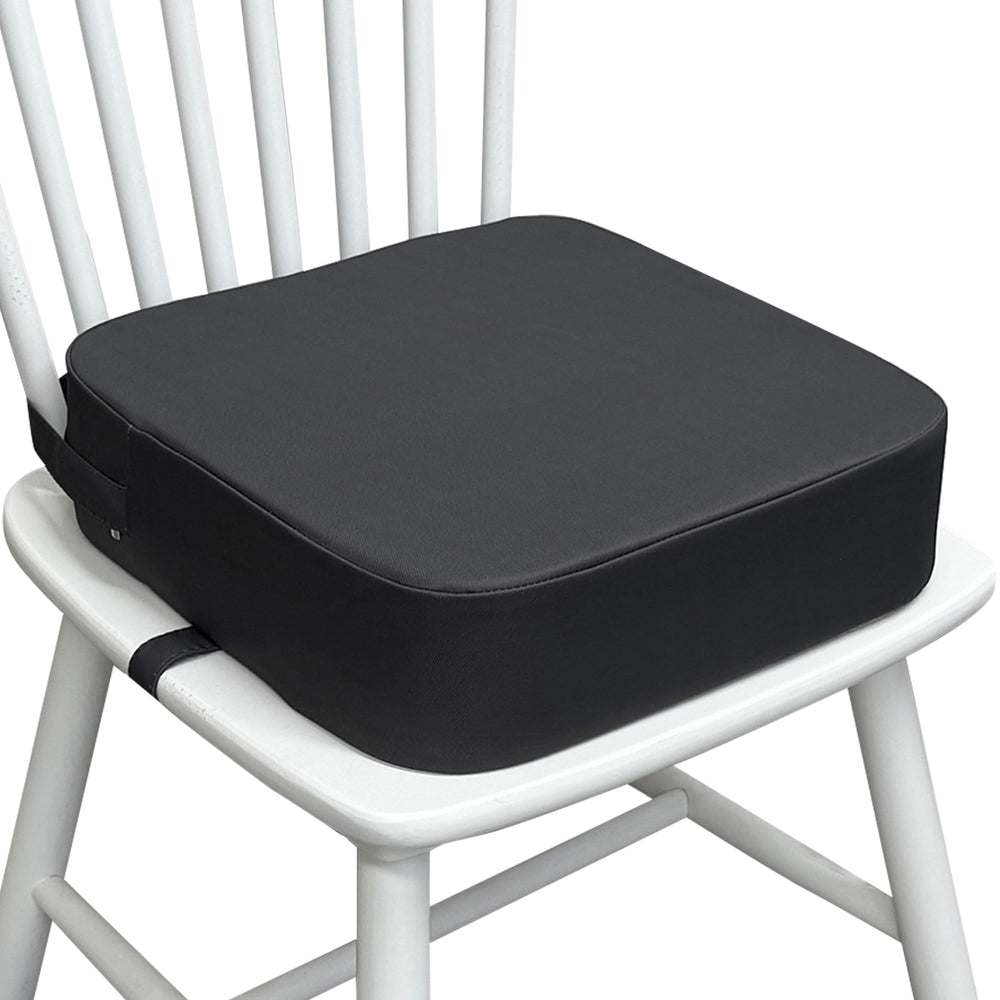 Acxseo Toddler Booster Seat on a dining chair supports independent self-feeding.