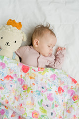 Addisson Belle 47x47 inch swaddle grows with baby for versatile use at home.
