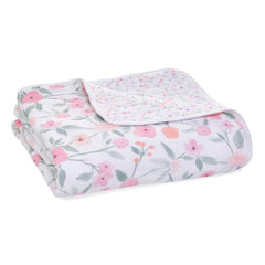 aden + anais dream blanket close-up shows 4-layer muslin softness for cozy snuggles