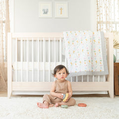 aden and anais Essentials changing pad cover on a standard pad promotes easy cleaning.