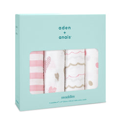 aden +anais Heart Breaker swaddle blanket used as a stroller cover for shade