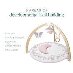 aden + anais Play and Discover Activity Gym muslin mat provides a soft surface for early exploration
