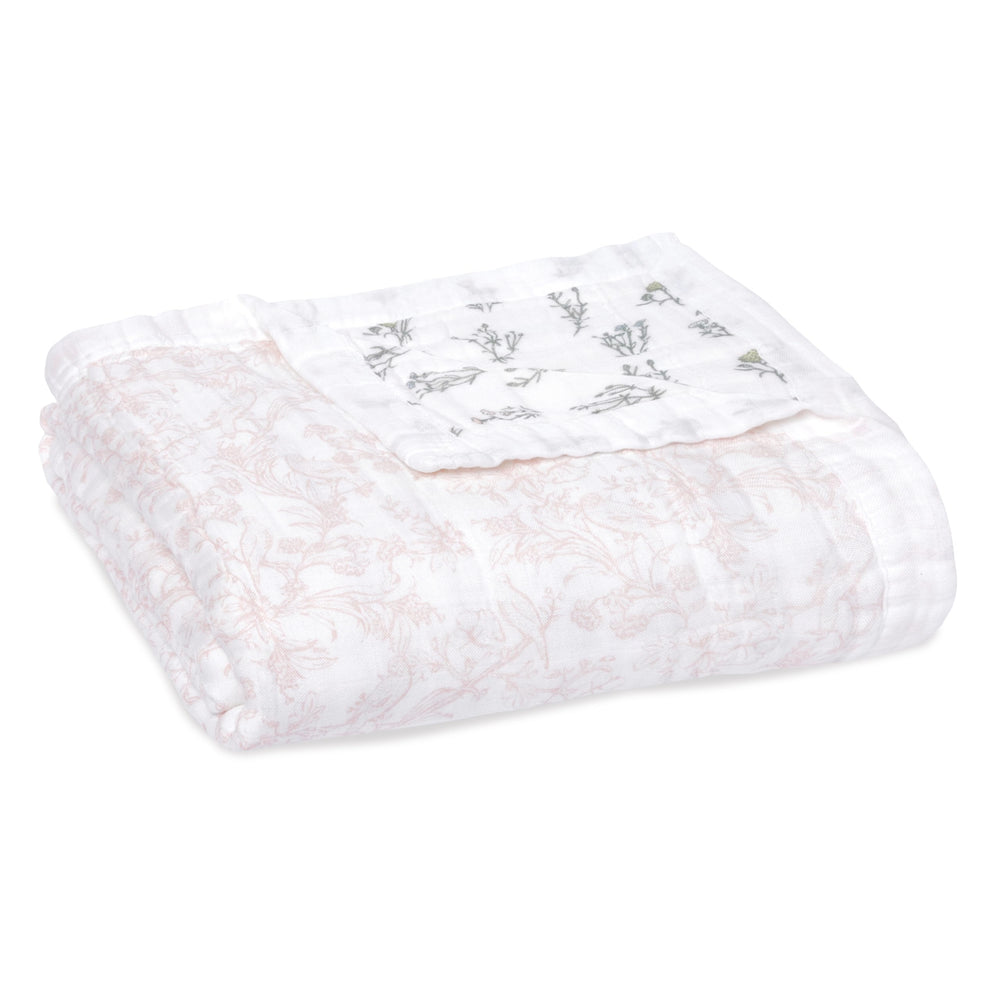 aden + anais silky soft dream blanket on crib for gentle newborn cuddles