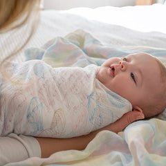 aden + anais swaddle blanket used as nursing cover for discreet feeding on the go