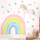 Affrolling unicorn wall decal with large rainbow creates a playful focal point in a child's room.