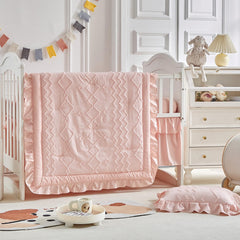 AIKASY ruffled crib fitted sheet in coral pink keeps baby comfortable through the night.