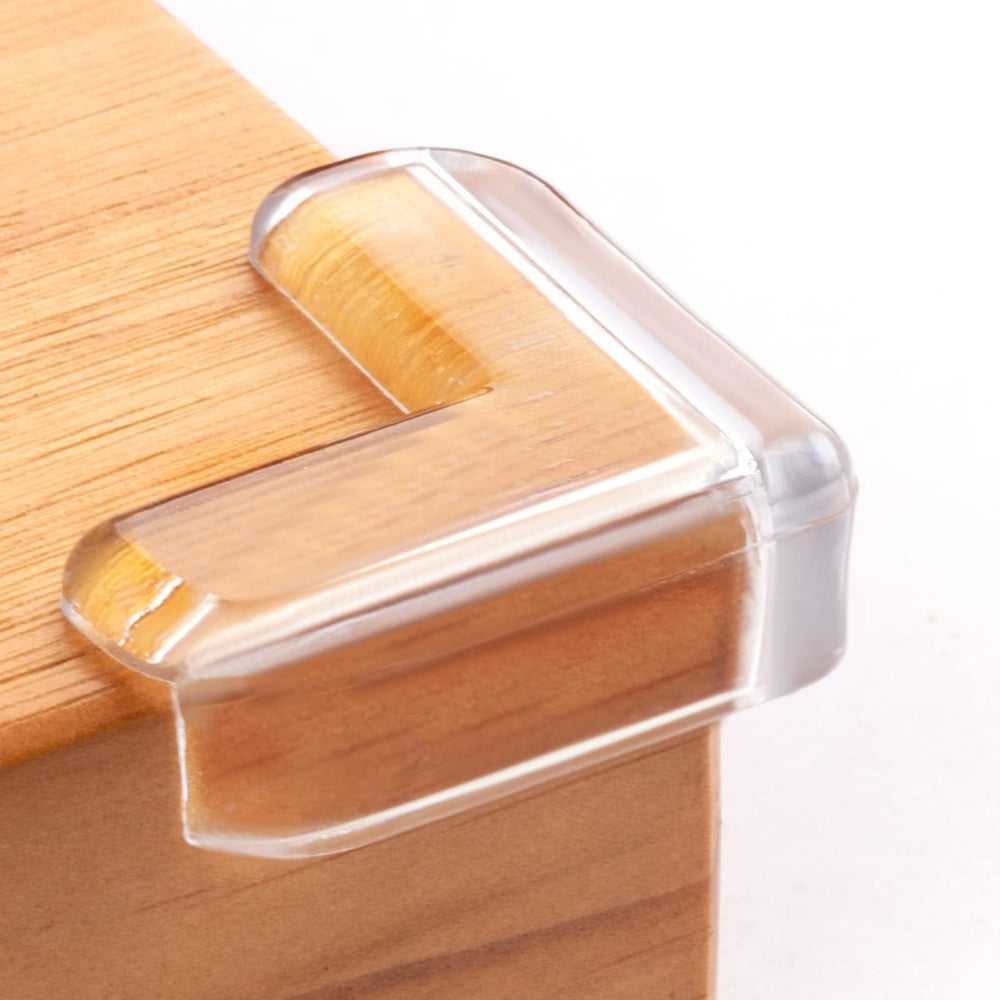 AIXMEET 12-pack table corner guards on a table edge for child safety.