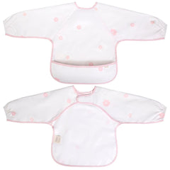 Ali+Oli Smock Bib pink flowers long-sleeve on baby for mess-free feeding.