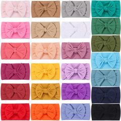 ALinmo soft-elastic headband close-up showing flexible fit for growing babies