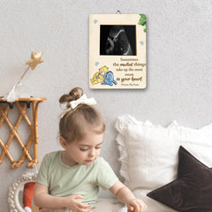 ALodr Winnie measuring tape bump frame adds playful milestones.