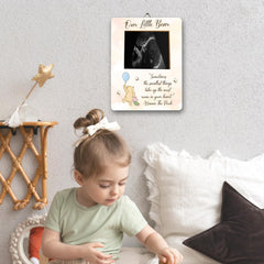 ALodr Winnie frame includes a measuring tape for playful bump measurements.