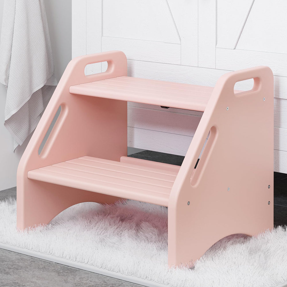 AMBIRD pink two-step stool side view highlights sturdy bamboo and kid-friendly stability.