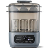 AMZBABYCHEF 4-in-1 bottle steamer and dryer in action for easy cleaning.