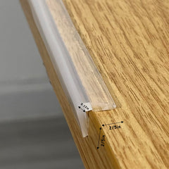 Angloria clear corner guards blend with wood and paint for discreet protection.