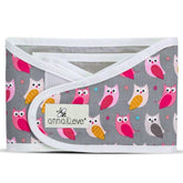 Anna and Eve baby swaddle strap arms-only keeps arms secure for relaxed naps.