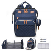 ANWTOTU baby diaper bag backpack with organized storage for on-the-go use.