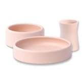 APLAINR weighted baby plate in pink sand with a stable base for mess-free meals.