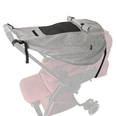 Apol pram sunshade in elastic fabric blocking UV while keeping baby viewable