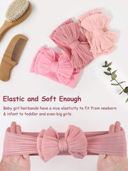 AQOKKA nylon-spandex headband offers gentle stretch for growing baby heads.