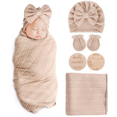 AQOKKA newborn receiving blanket with bow, hat, and mittens for soft, breathable swaddling.