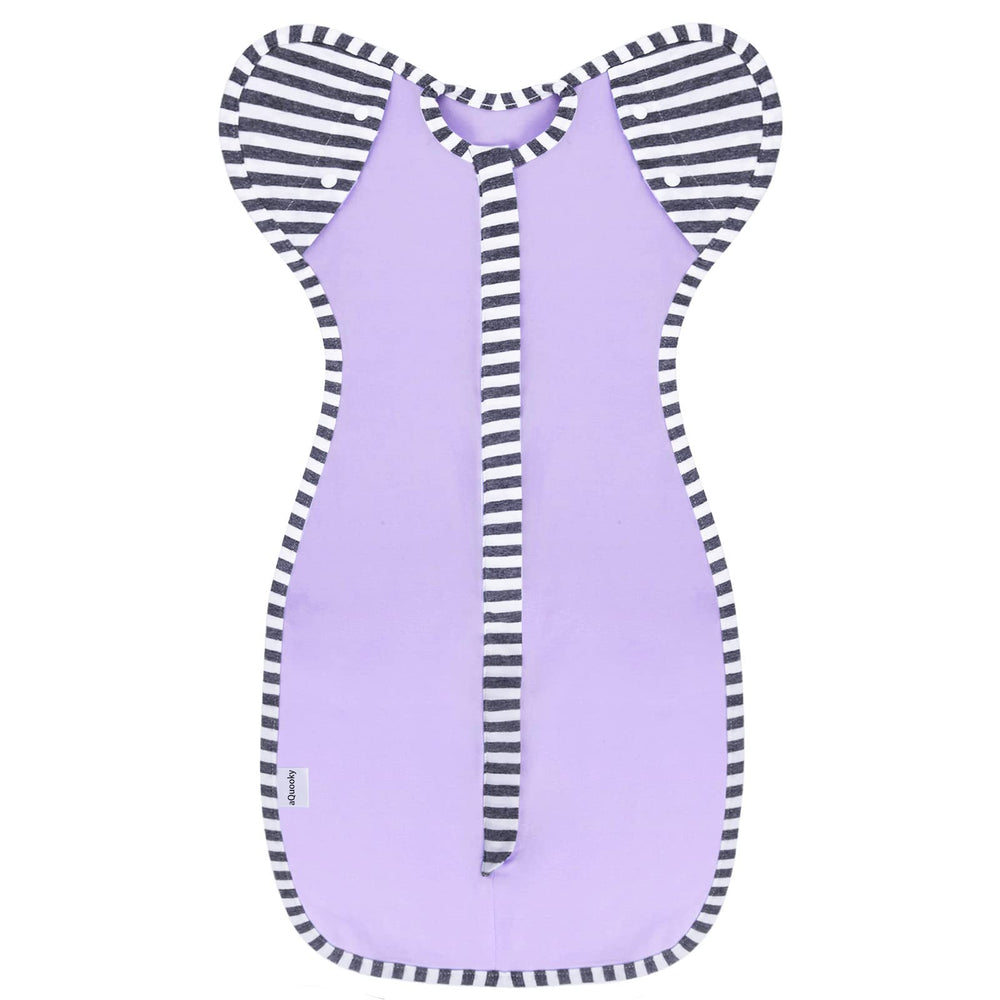 aQuooky arms-free blanket sack shows womb-like comfort for calmer sleep