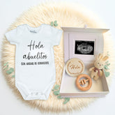ArtEleven Hola Abuelitos crochet bunny included in a heartwarming grandparent pregnancy announcement set.