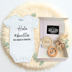 ArtEleven Hola Abuelitos crochet bunny included in a heartwarming grandparent pregnancy announcement set.