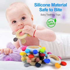 Arudyo wooden beech teething ring provides a secure grip for tiny hands.