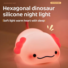 ATSUI Axolotl night light on bedside softly illuminates bedtime.