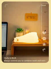ATSUI Duck Night Light charging on USB-C stand for easy power