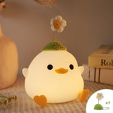 Attivolife cute duck night light with flower hat on shelf adds charm to room
