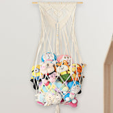 Aufee stuffed animal storage hammock in corner setup saves floor space for toys.