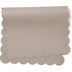 AVA + OLIVER vegan leather changing mat in grey scallop folded for travel