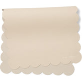 AVA + OLIVER vegan leather changing mat in cream scallop laid flat for easy diaper changes