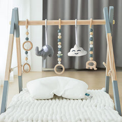 Avrsol wooden baby play gym with five toys for sensory play
